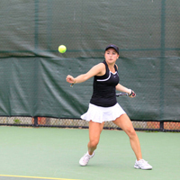 Cecily Wuenscher prepares to return a shot.